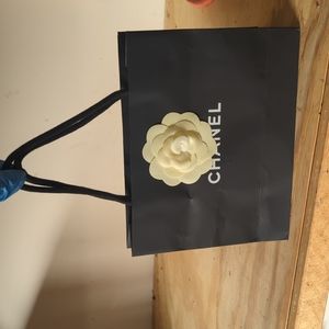 Authentic empty Chanel bag w/ Camilla flowers and empty earring box from closet
